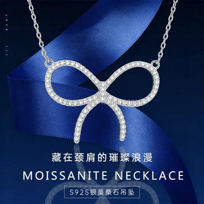 Pave Bowknot Moissanite Pendant Necklace in Sterling Silver