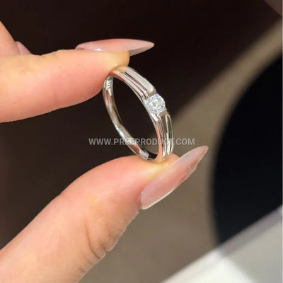 Möbius Moissanite Solitaire Ring in Sterling Silver