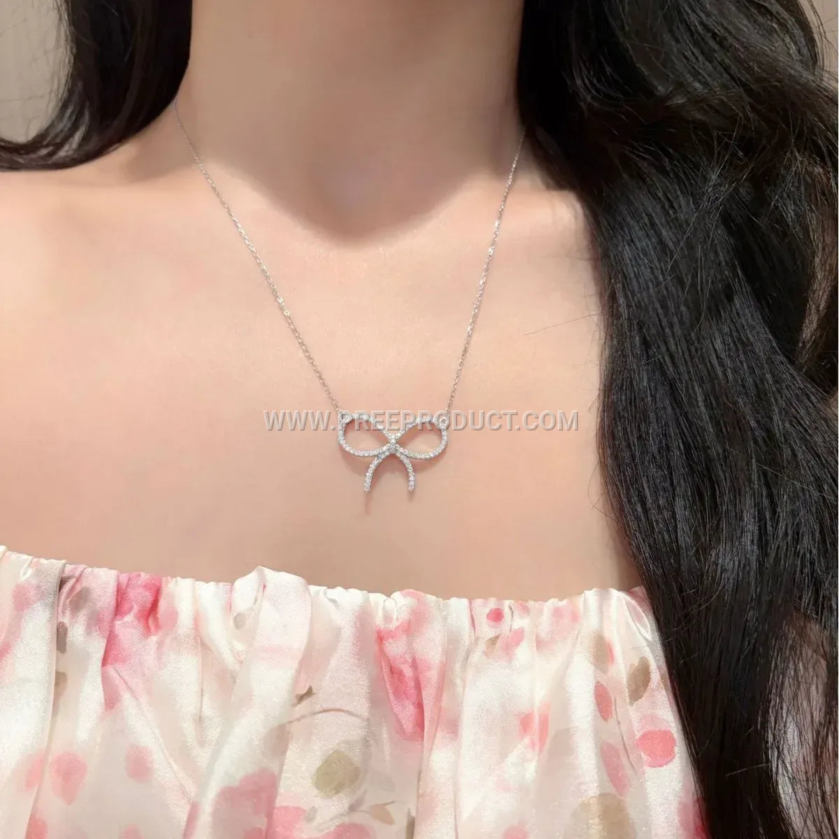 Pave Bowknot Moissanite Pendant Necklace in Sterling Silver