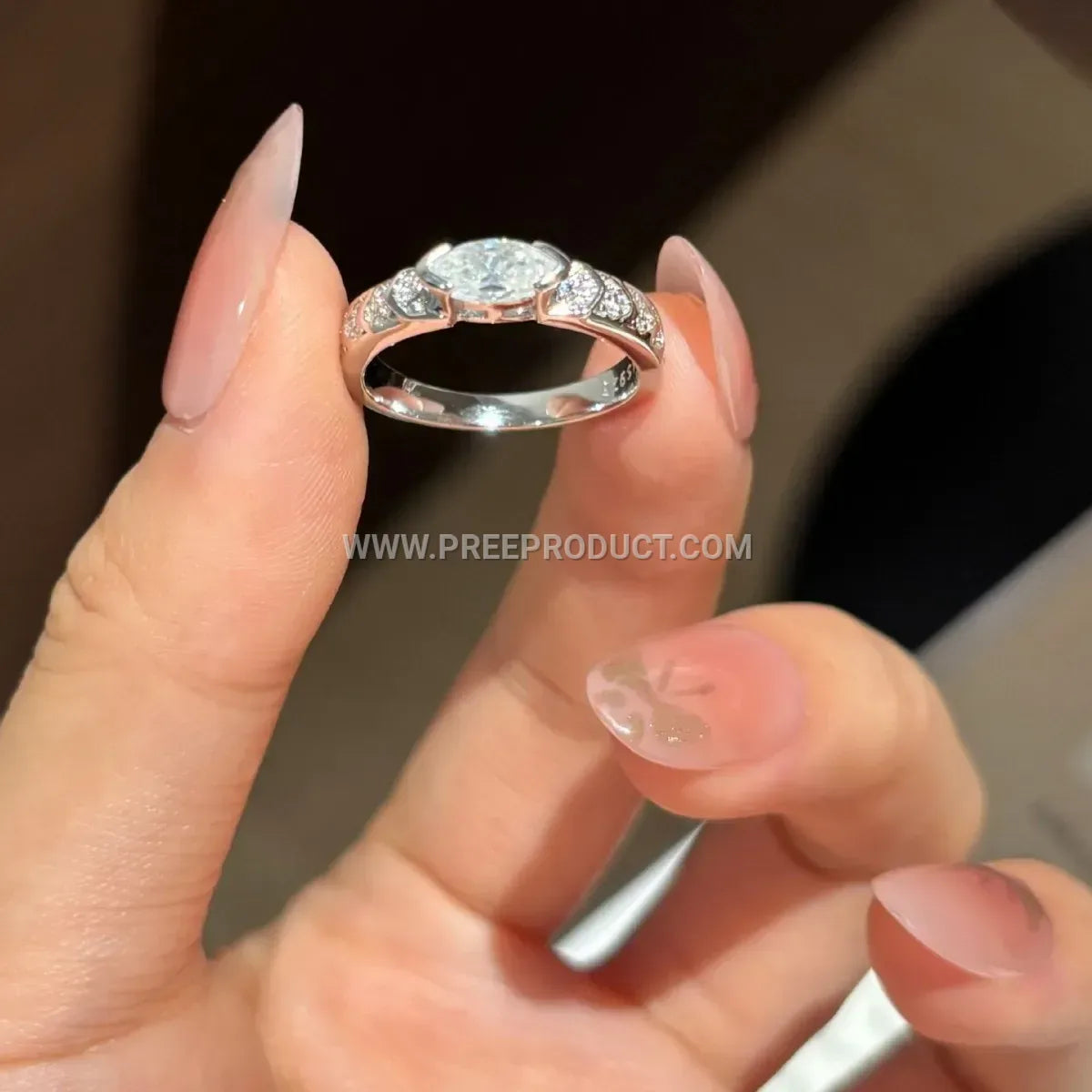 Marquise Cut Moissanite Eye Emblem Ring in Fine Sterling Silver