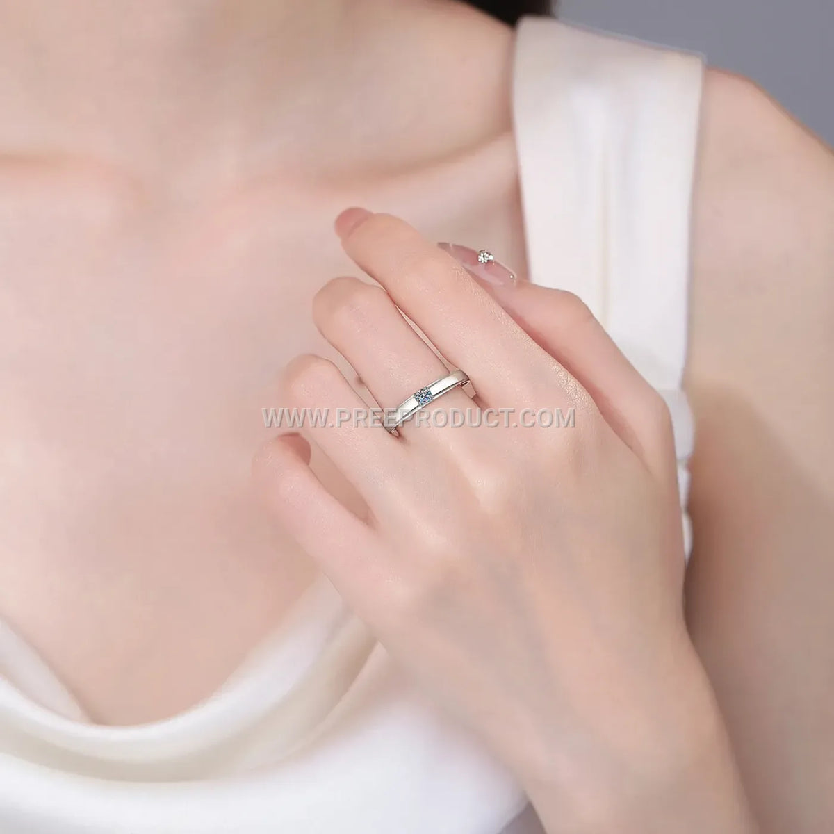 Mobius Silver Band Ring Accentuated with Sparkling Moissanite