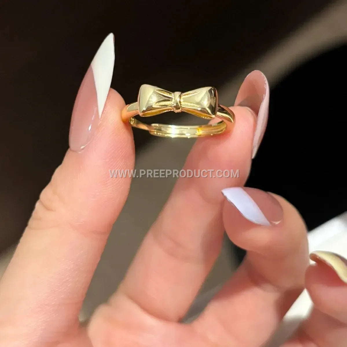 Eighteen Karat Gold Plated Sterling Silver Bow Ring