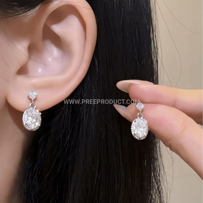 Oval Cut Moissanite Solitaire Stud Earrings in Fine Sterling Silver